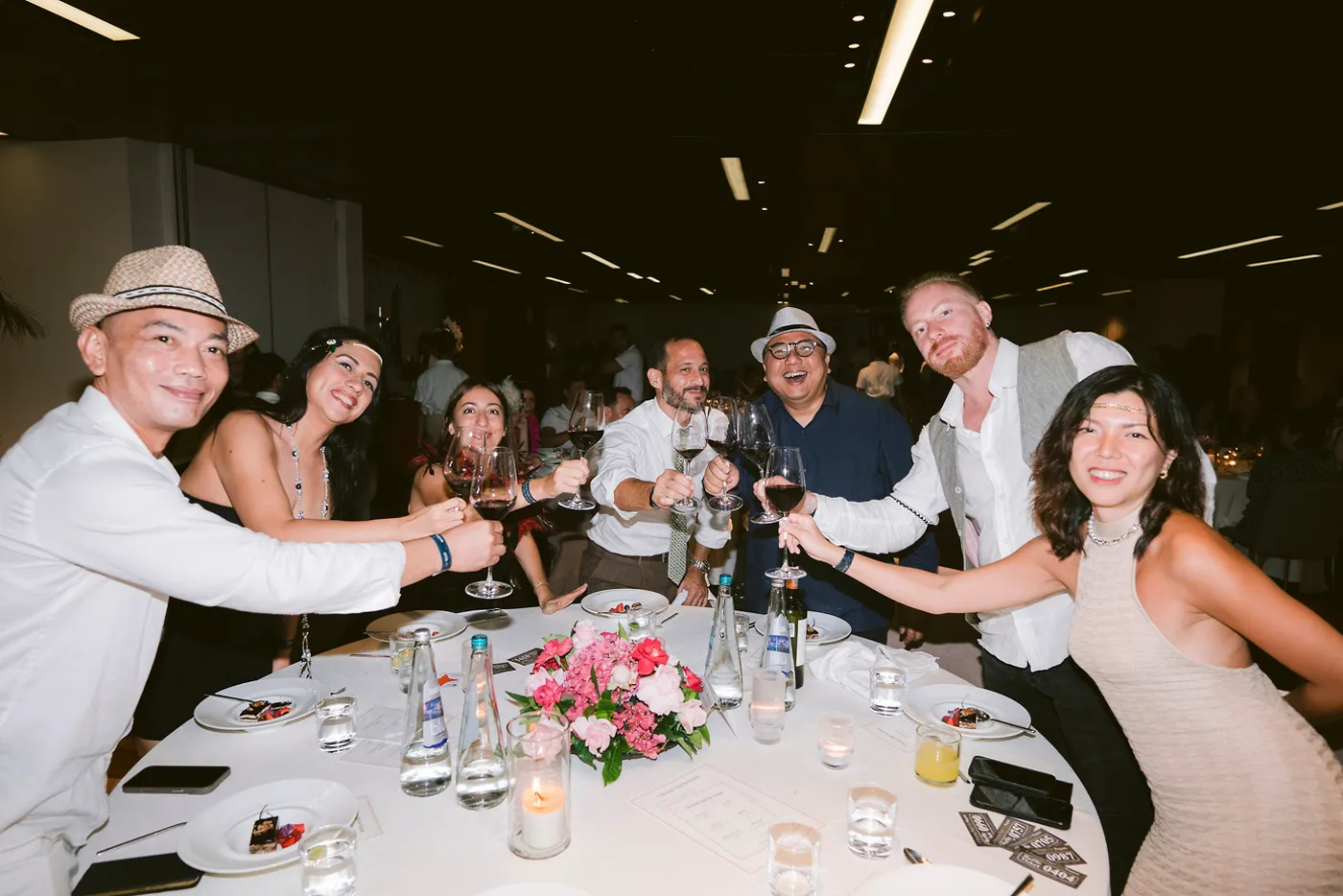 Guests raising a toast at a past Right Reasons dinner